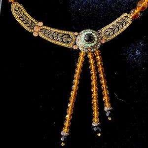 Vintage look crystal necklace. Can be adjusted to be a choker or longer.